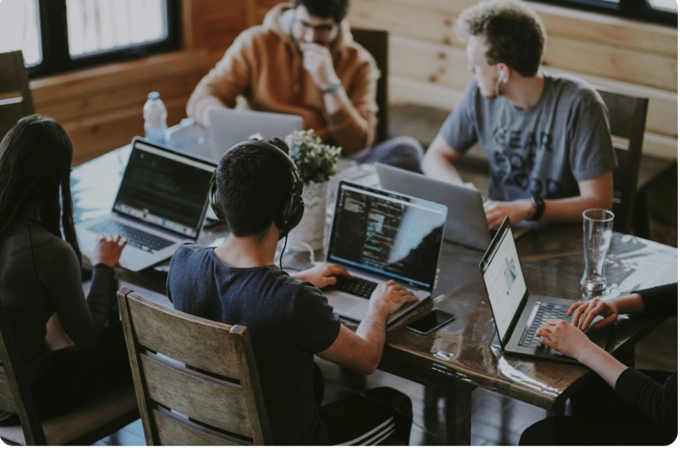 Education consultants collaborating around a table